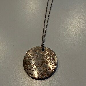 Tiffany & Co. sterling silver round "Notes" pendant necklace